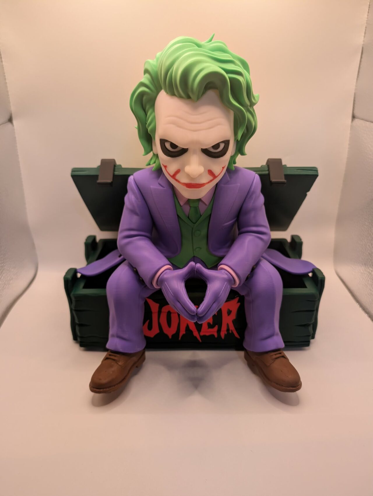 Joker Figure on Chest by Grimm Forge Studios